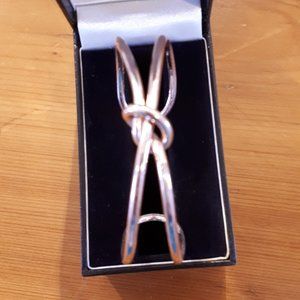 Rose Gold Pated Lover's Knot Cuff Bracelet